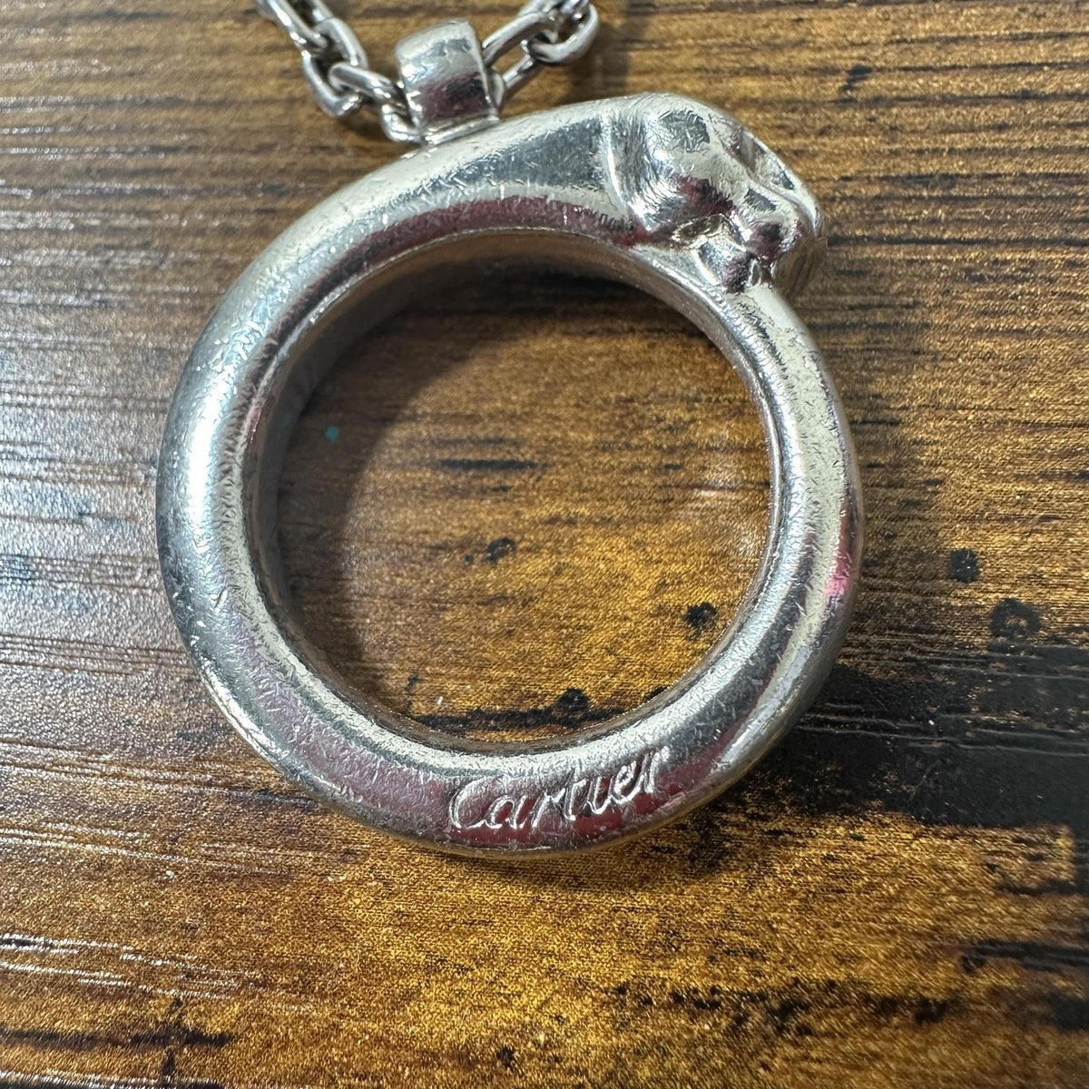Cartier Silver Metal Panther Circle Keychain Bag Charm Engraved Pendant