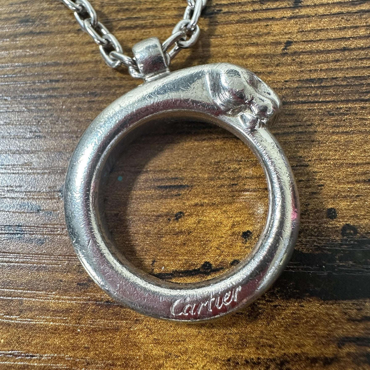Cartier Silver Metal Panther Circle Keychain Bag Charm Engraved Pendant