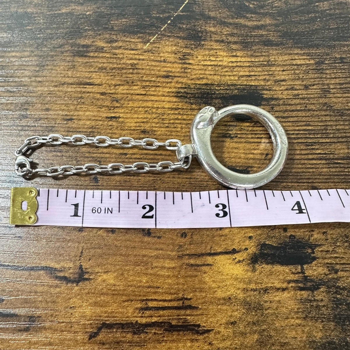 Cartier Silver Metal Panther Circle Keychain Bag Charm Engraved Pendant