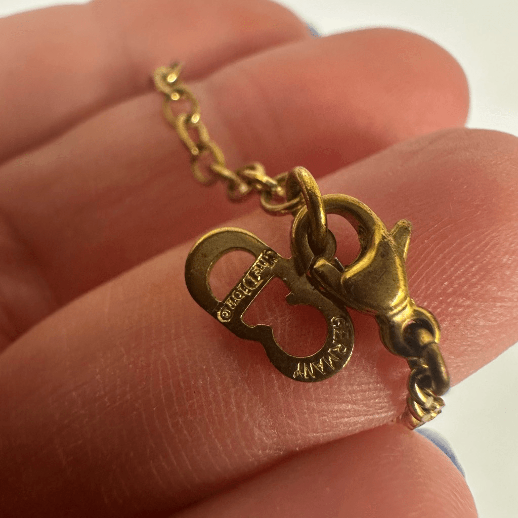 Christian Dior CD Logo Gold Tone Rhinestone Pendant Necklace