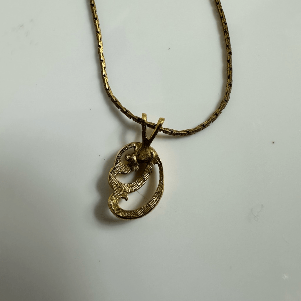 Givenchy Vintage Gold Tone Pendant Necklace