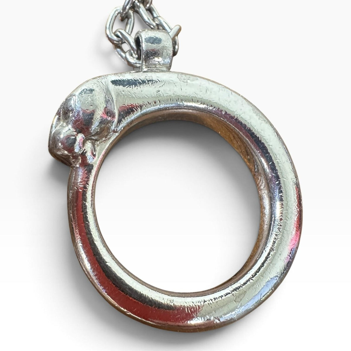 Cartier Silver Metal Panther Circle Keychain Bag Charm Engraved Pendant