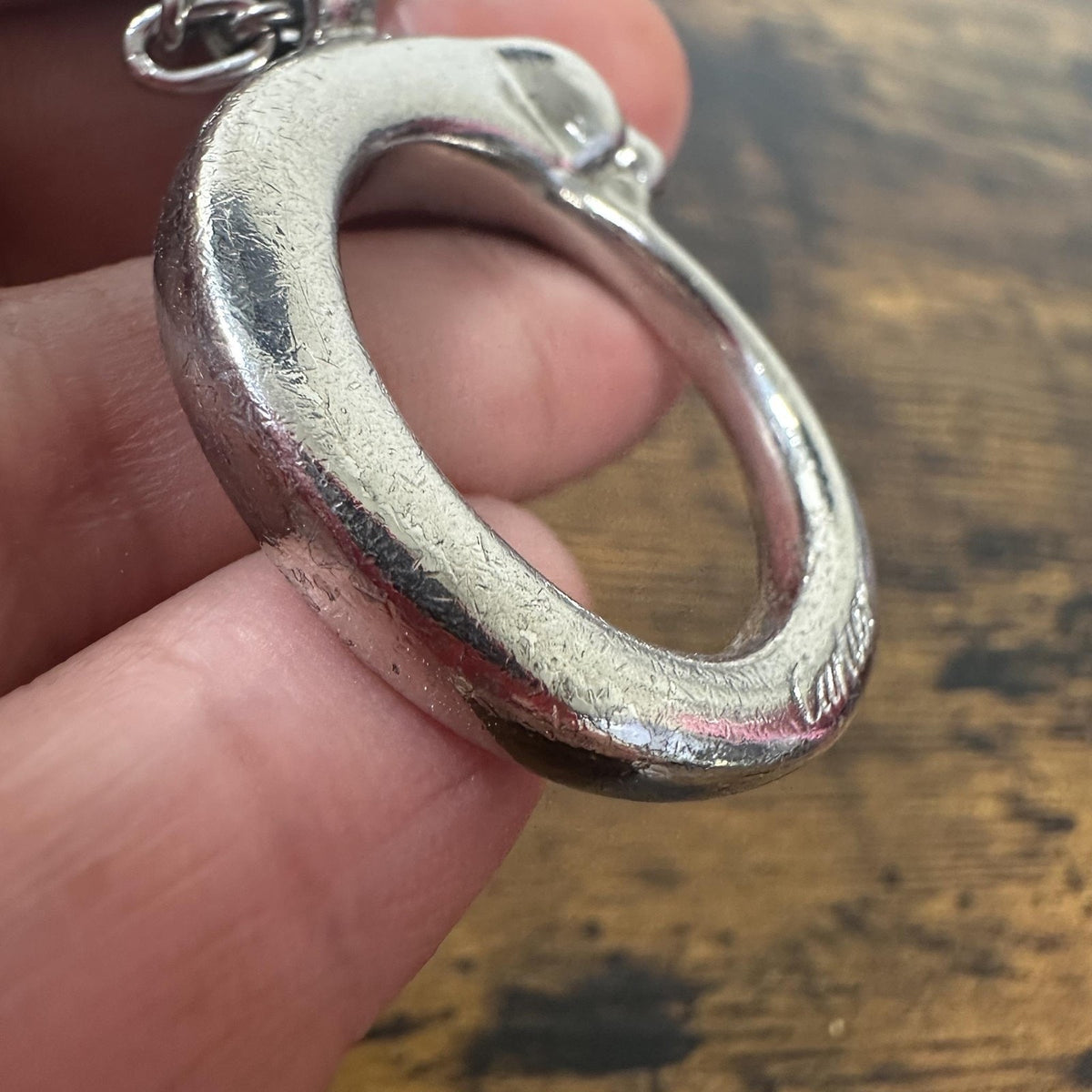 Cartier Silver Metal Panther Circle Keychain Bag Charm Engraved Pendant