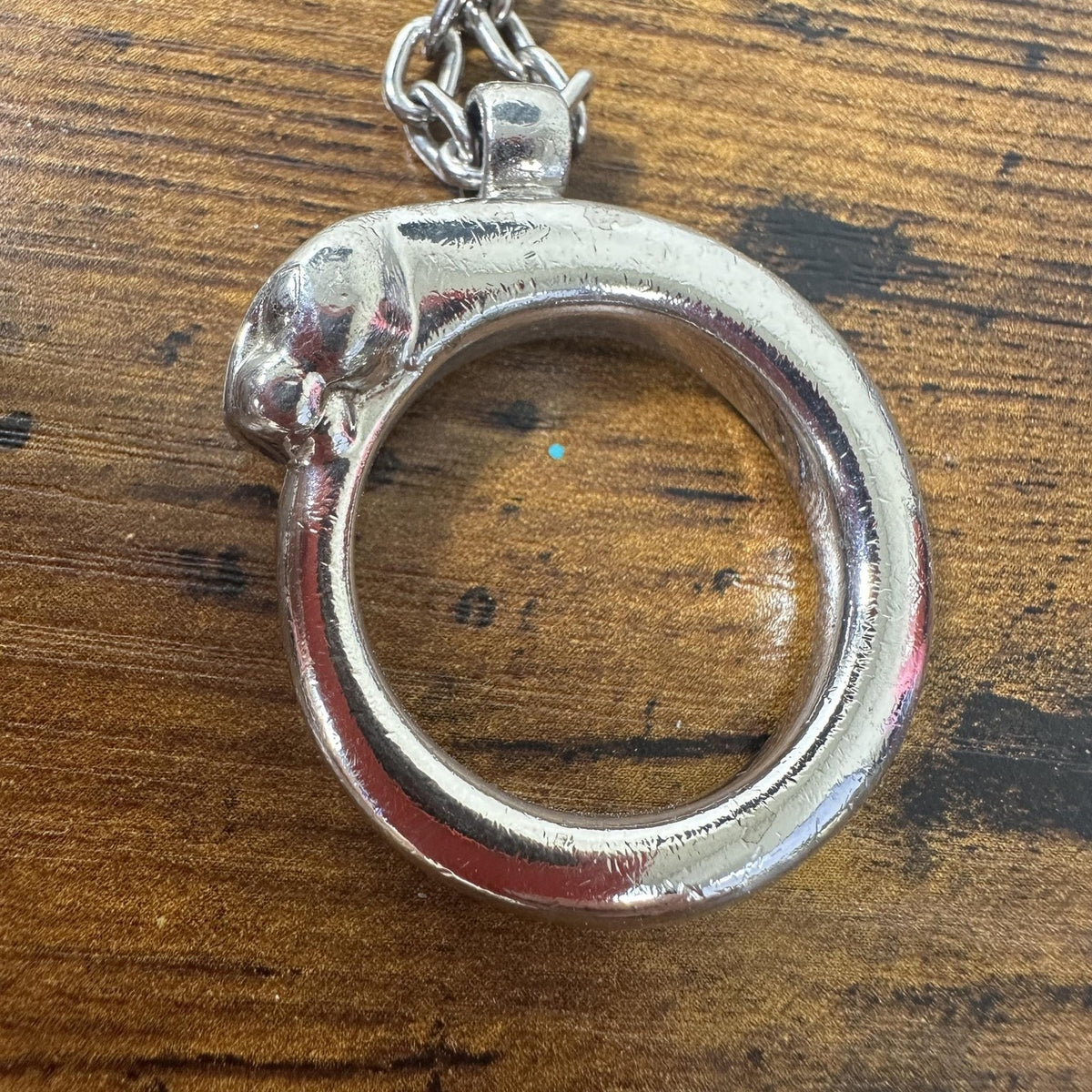 Cartier Silver Metal Panther Circle Keychain Bag Charm Engraved Pendant